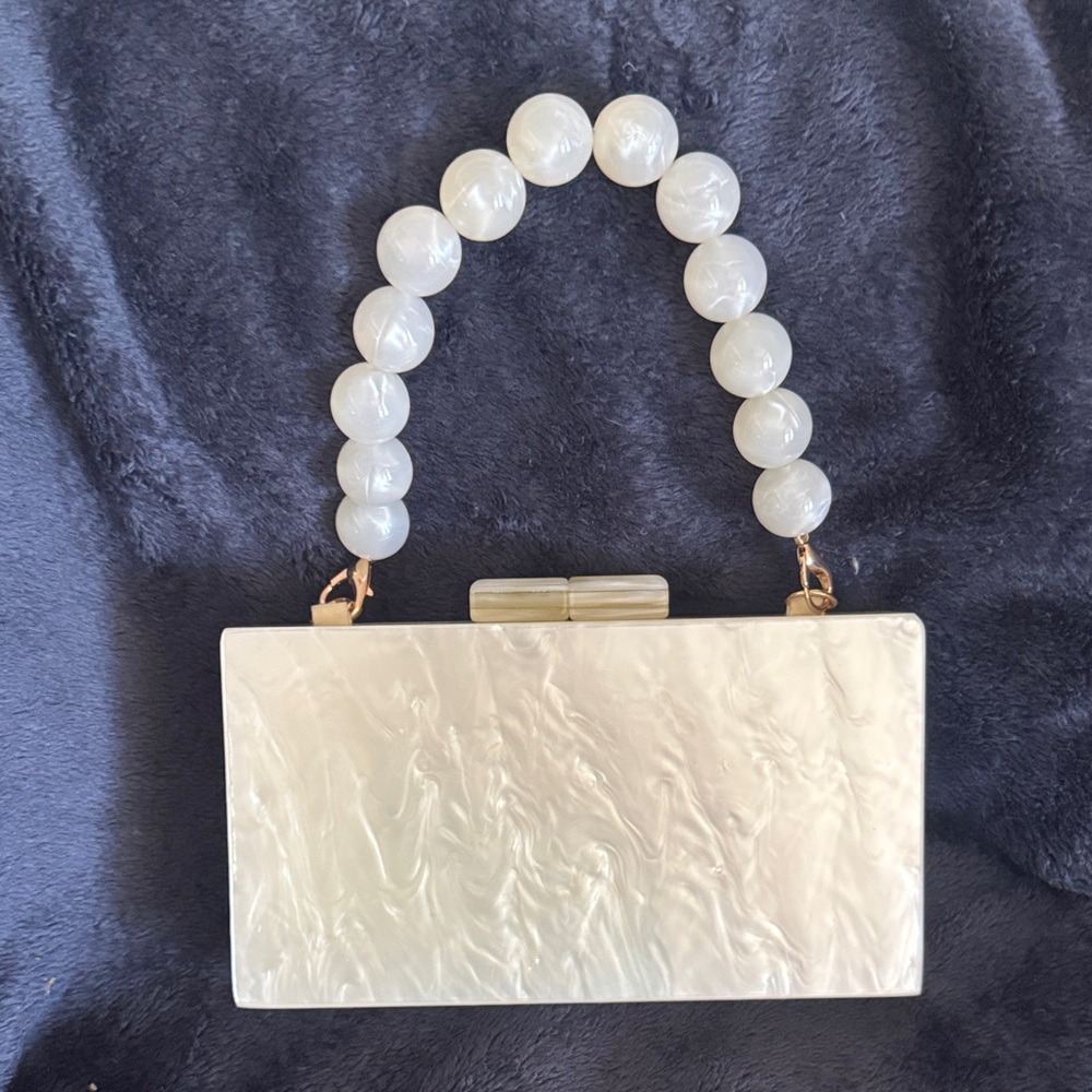 Elegant Cream Clutch with Beaded Handle